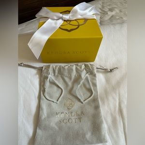 Kendra Scott dangle earrings in white